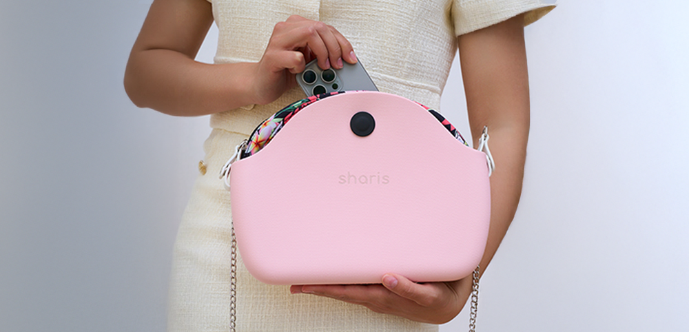 Розовая кроссбоди с кнопкой и цепью